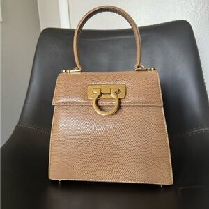 Salvatore Ferragamo lizard handbag, made in Italy for Ferragamo’s creations.